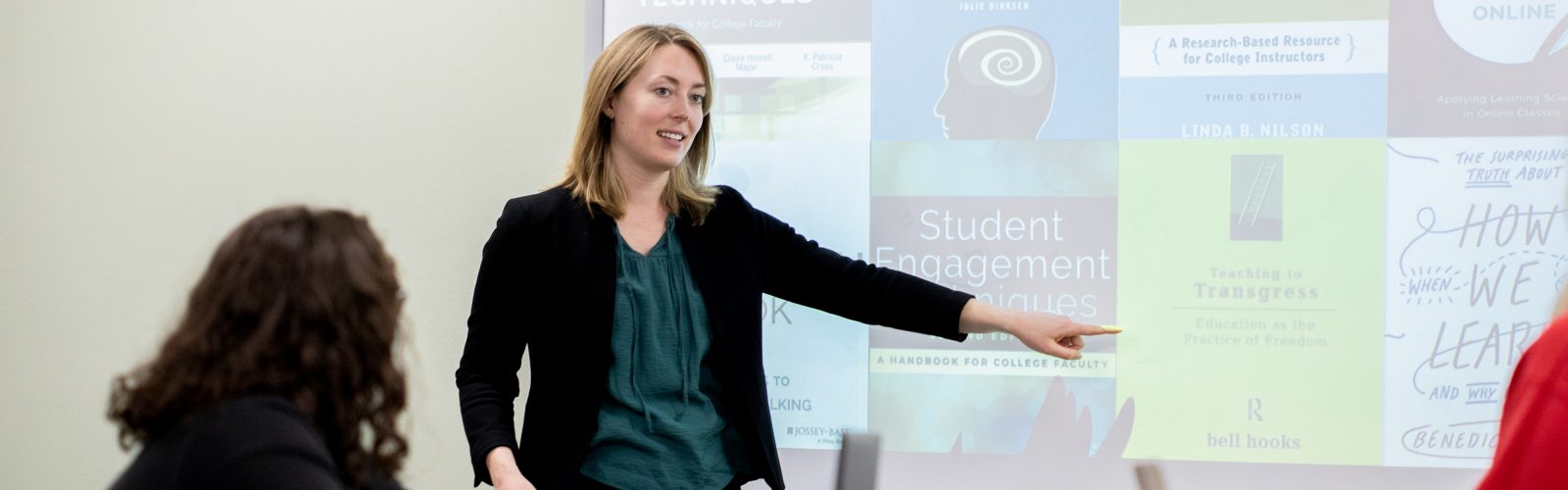 UW School of Education person presenting to an audience.