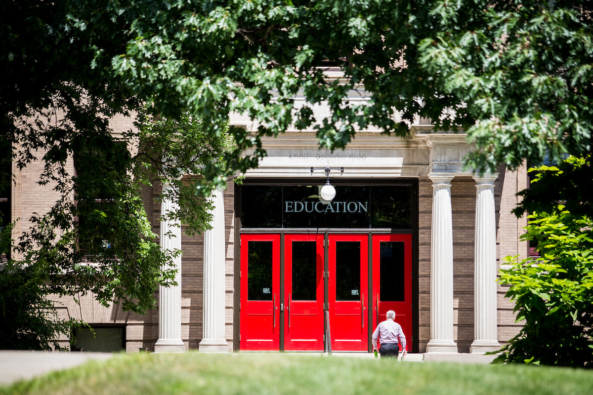 Photo of UW School of Education red doors entrance.
