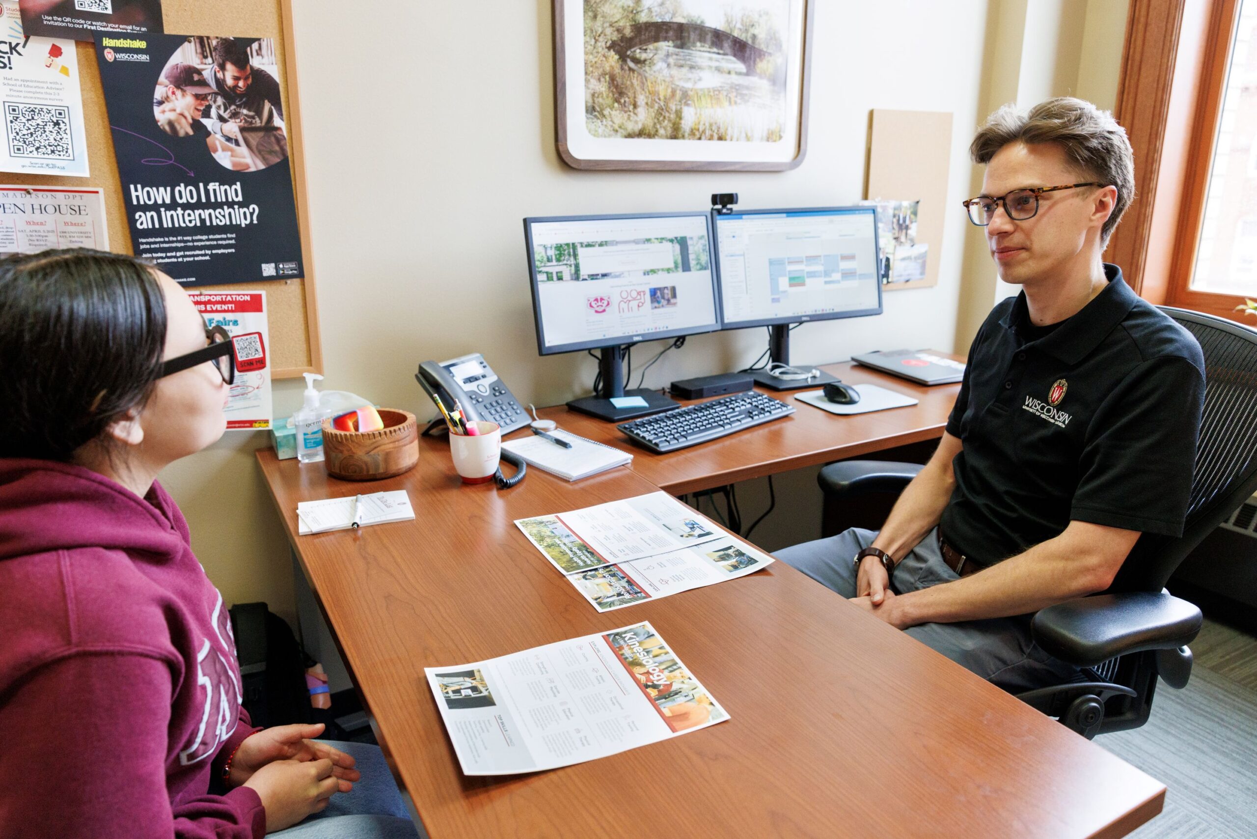 image of a career advisor meeting with a student