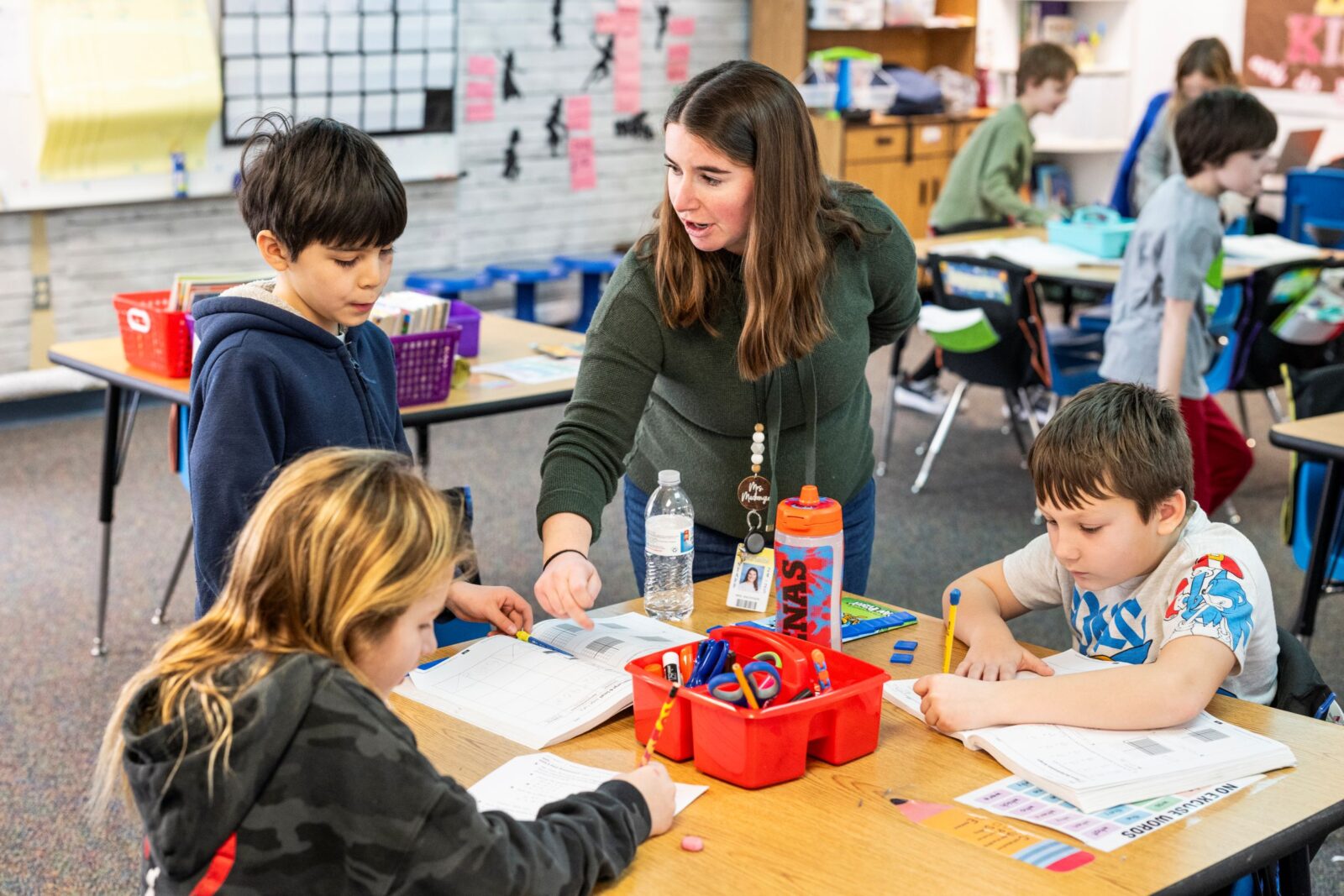 a teacher working with young children