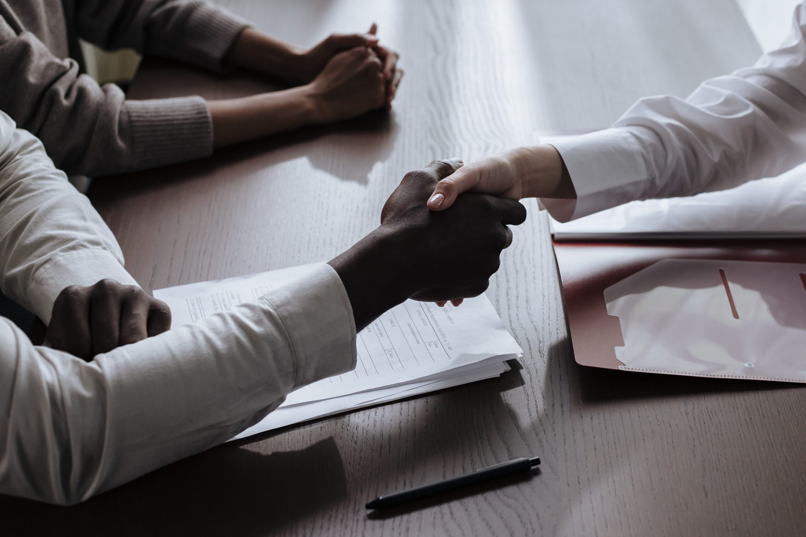two people shaking hands