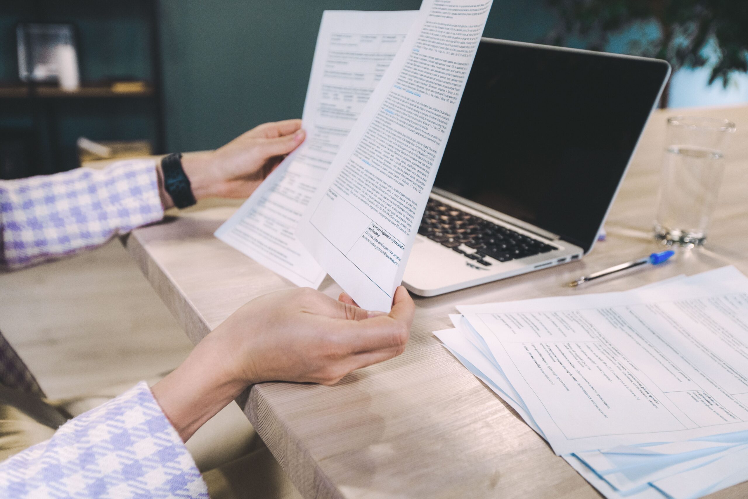 a person holding papers